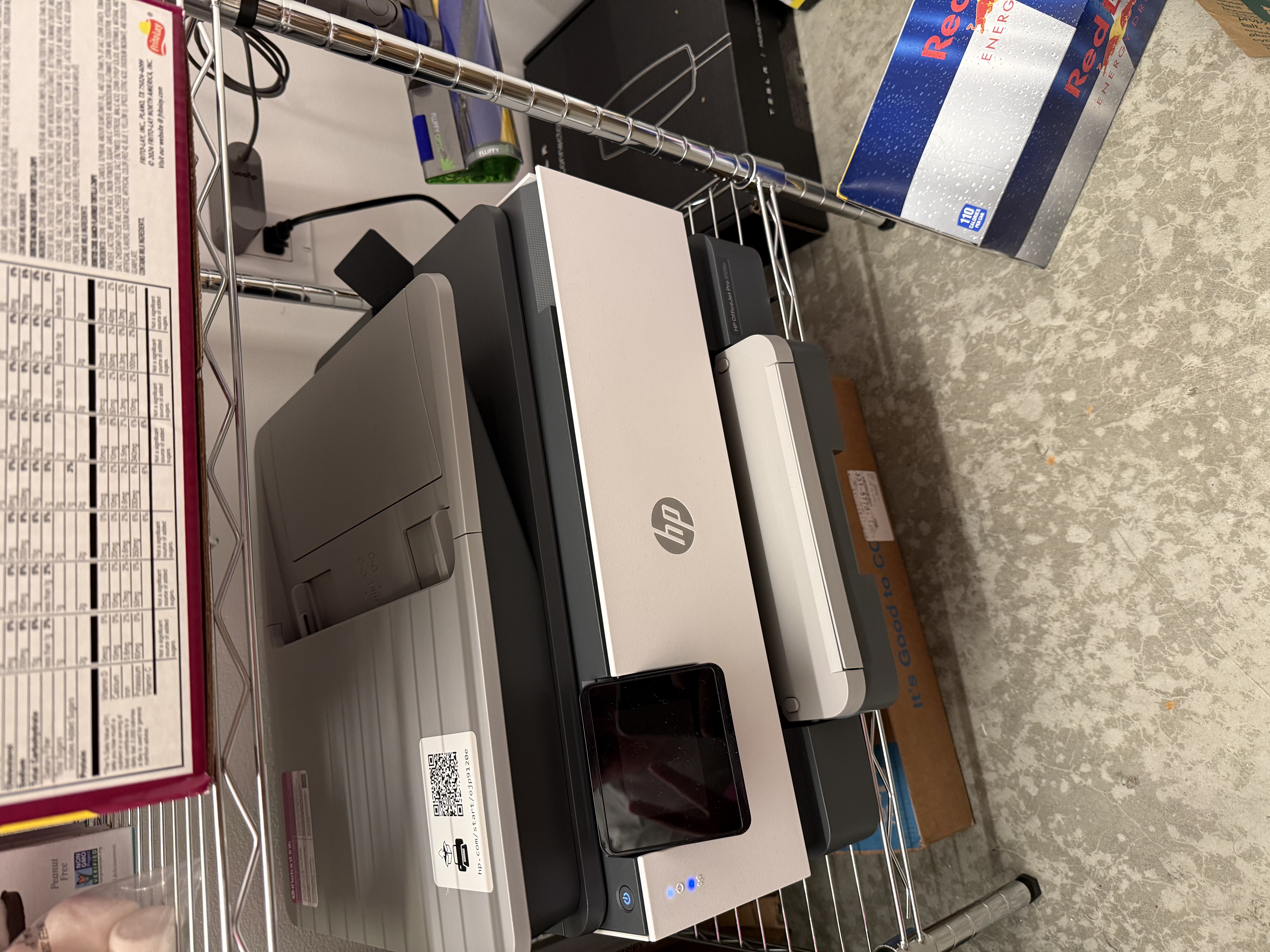 HP OfficeJet at the bottom of a rack